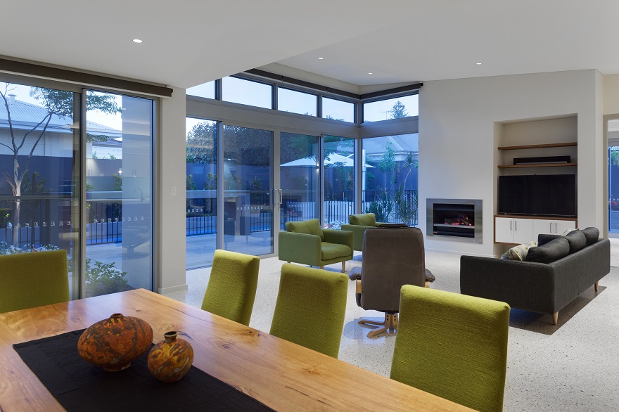 Lots of natural light flowing into living and dining areas of this designer home.