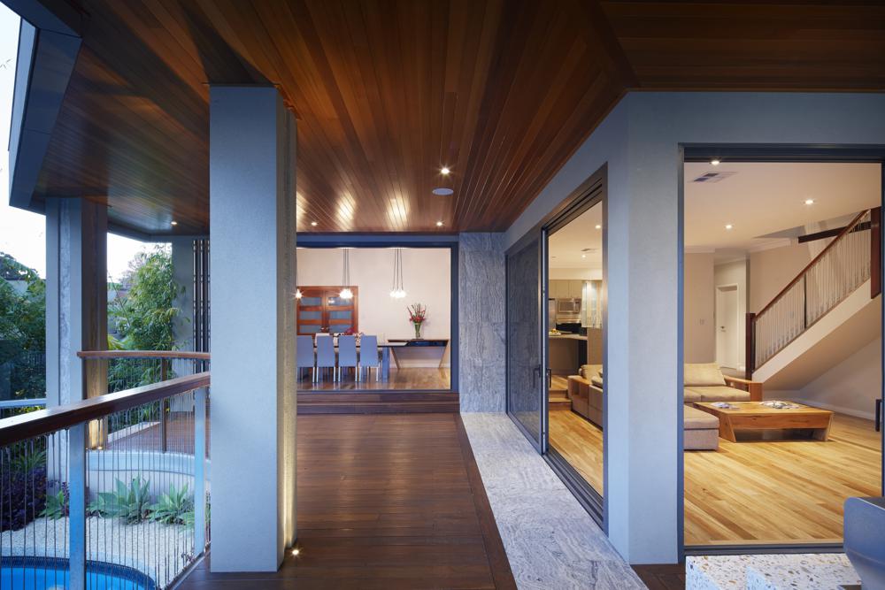 Beautiful timber deck verandah and glass windows looking in Floreat home built by Sol Construction.